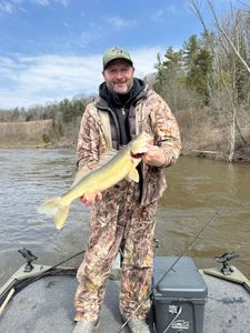 A lone angler fishing in the state of Michigan