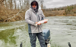 One fisherman standing in water at Brethren