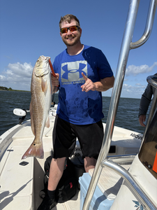 Reeling in redfish glory with epic deep sea action!