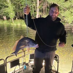 Angler fishing with rod and reel in Tennessee
