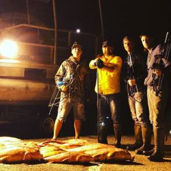 Five people enjoying a fishing trip in TN