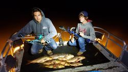 Two people fishing in Nolensville