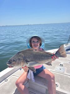 Angler fishing with rod in scenic FL location