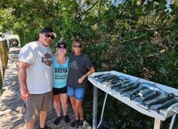 Three people fishing at Bay Pines