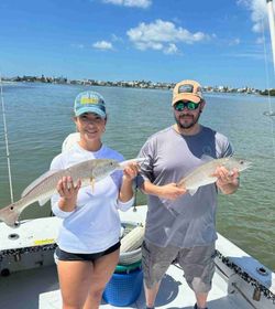 Two redfish caught during a fishing trip in FL