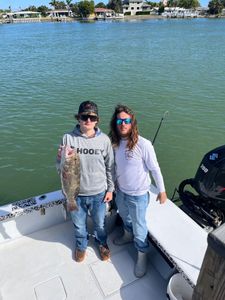 Two people fishing in FL