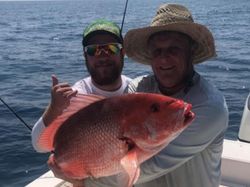 Two anglers with a big catch at Port Orange