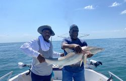Two people fishing in FL