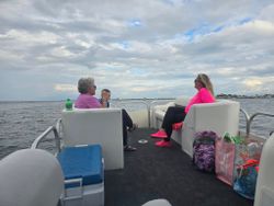 Tour boat with passengers enjoying scenic water views in Fort Walton Beach FL
