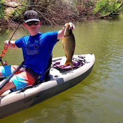 Angler with a 15-inch fish caught in AZ