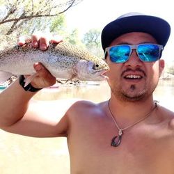 A lone fisherman casting a line in Arizona