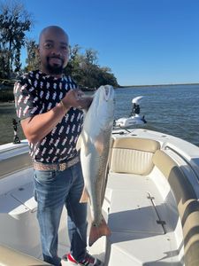 Angler enjoying fishing tour in Midway