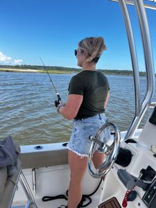 A person on a fishing tour in Midway