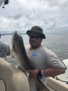 fisherman and friend fishing in georgia
