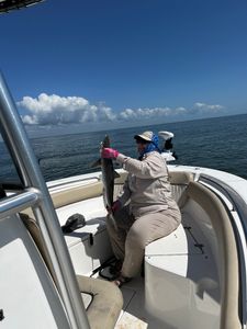 One angler reels in a 26-inch catch at Midway