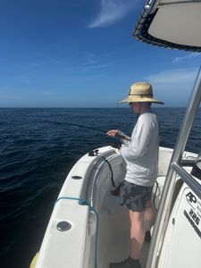 A person enjoying a fishing tour in Midway