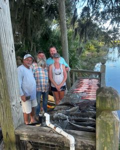 Four people enjoying a fishing tour in Midway