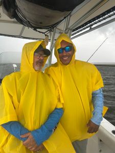 Two people enjoying fishing tours in Midway