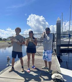 3 people fishing on Daytona Beach in Florida