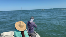 A day on the water, reeling in the catch.