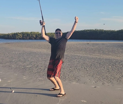 Person fishing at Daytona Beach