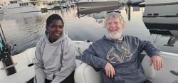Two people enjoy fishing tours in Daytona Beach