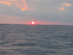 Perfect evening for deep sea jigging and trolling. Partly cloudy skies made for exciting fishing conditions.