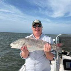 Angler with a big fish in Charleston
