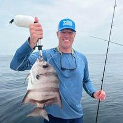 Angler with a catch in Charleston