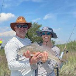 One fishing rod and gear in scenic SC location