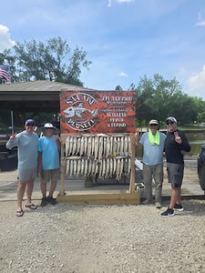 Four people fishing in Monroe