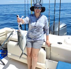 Catching a blue runner fish at Fort Walton Beach