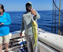 Proud grin. Vibrant Mahi.