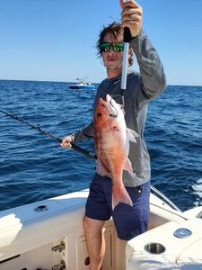 Two people fishing in Fort Walton Beach