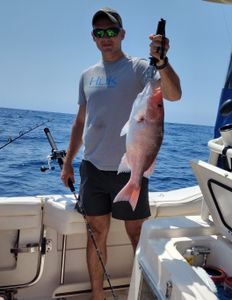 Angler catches fish in Fort Walton Beach