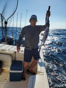 Angler holding a 15-inch fish at Fort Walton Beach