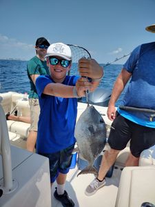 Catch of the day! A grey triggerfish measuring 32 inches.