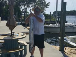 Angler with a big fish caught in Panama City Beach