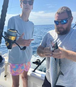 Two anglers enjoying a fishing trip in Panama City Beach