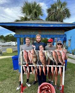 Five people fishing at Panama City Beach