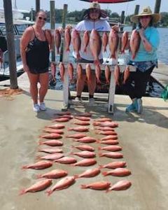 Three people fishing in Panama City Beach