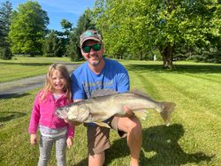 Pike-Perch fish caught by two people in Medina