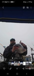 Fisherman with one 17-inch fish in North Carolina