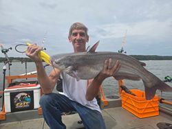 Angler fishing for a blue catfish in Mocksville