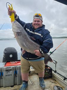 Fisherman holding a rod in NC