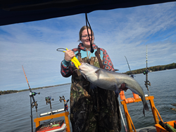 Great catch using trolling and heavy tackle! Partly cloudy conditions made for an exciting adventure on the water.