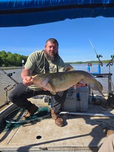 A single fisher casting a line in North Carolina