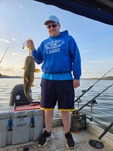 A lone angler fishing in Mocksville