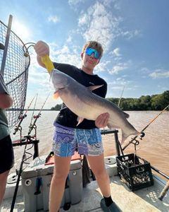 Photograph of a white catfish measuring 24 inches, caught while fishing in NC.
