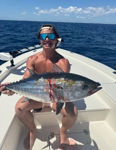 Angler with a large blackfin tuna fish caught in Belhaven